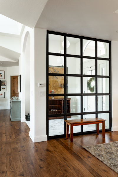 Foyer with large framed glass partition